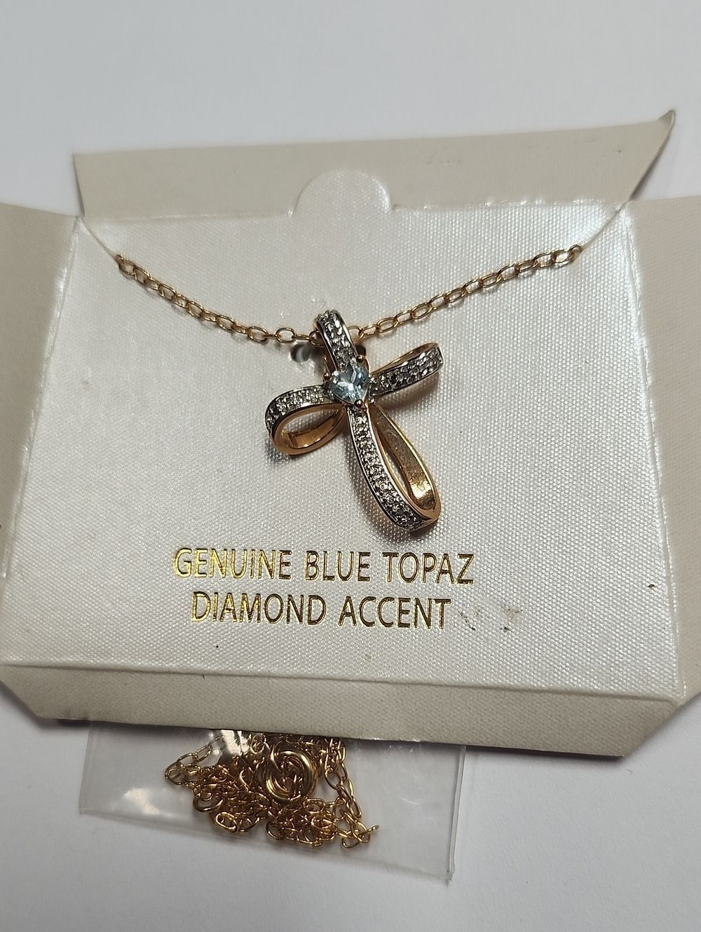 Blue Topaz and Diamond Accent Cross Necklace - Gold Tone